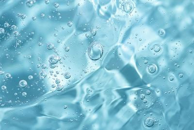 Klare blaue Gel-Textur mit kleinen Luftblasen