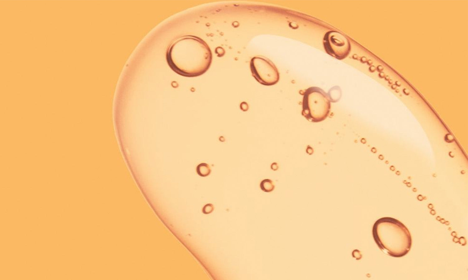 Geltextur Bubble vor hellorangenem Hintergrund